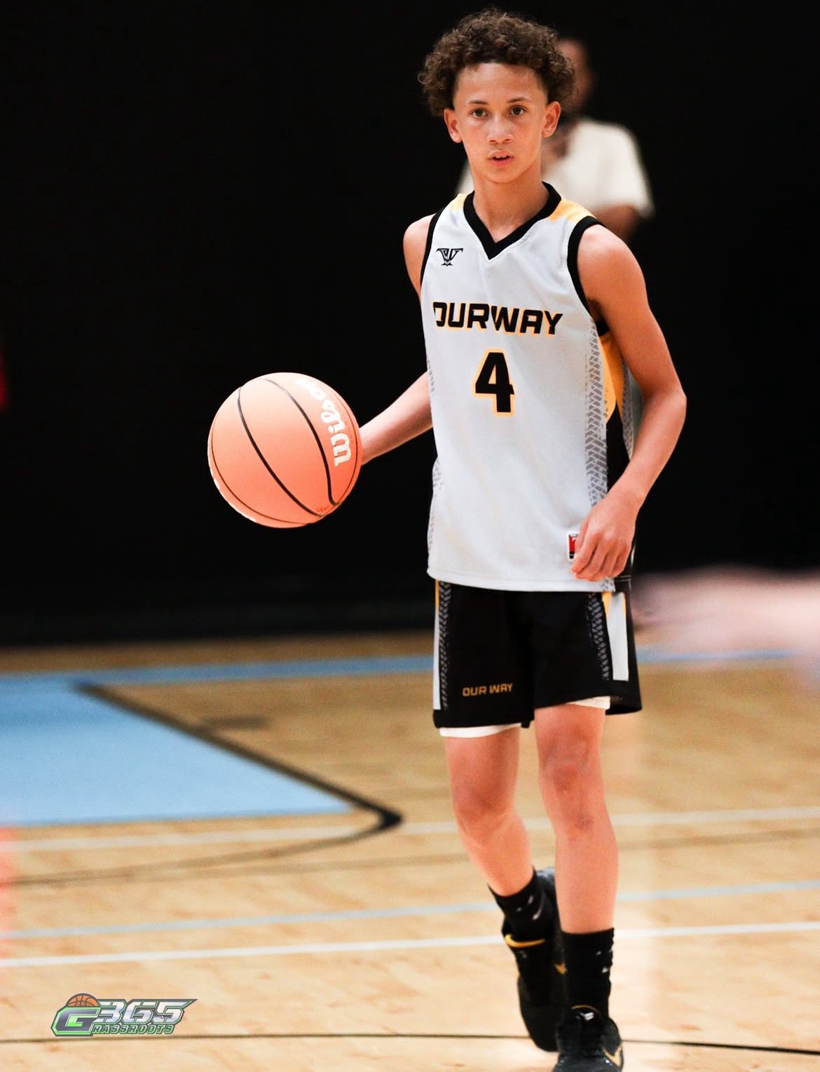 OW player in the white uniform bringing the ball up
